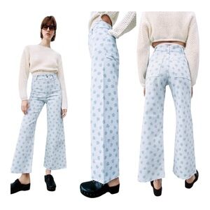 Cream‎ Sweater and Patterned Blue Jeans